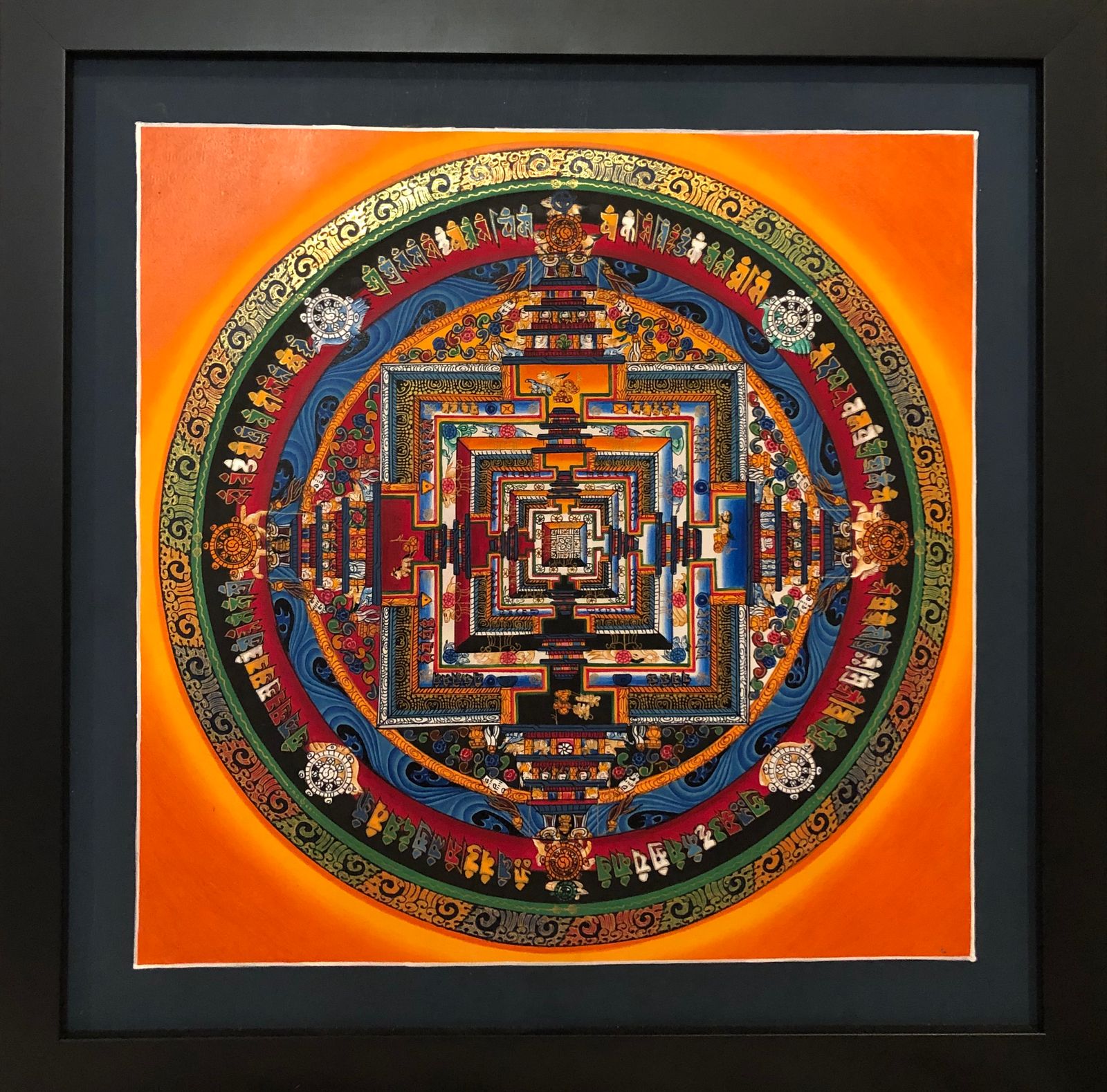 Orange Kalachakra Mandala (wheel of time). Original artwork from Nepal.