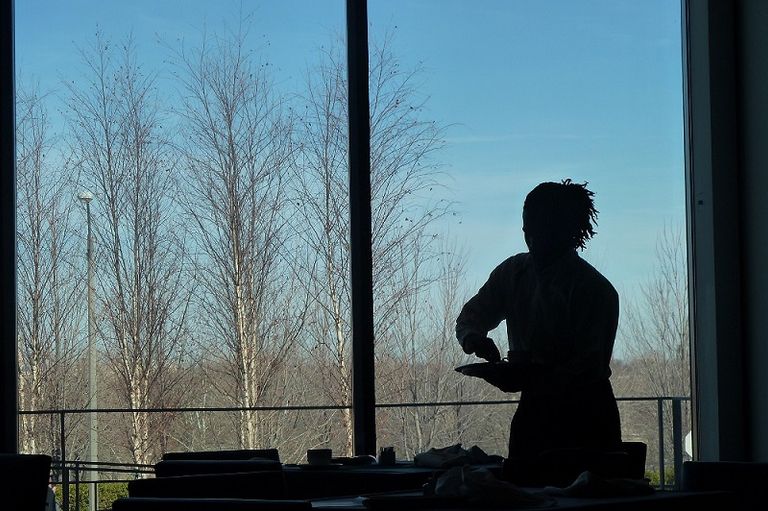 Shadow man in cafeteria