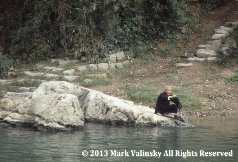 OLD MAN ON A ROCK